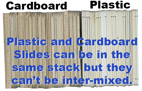 cardboard and plastic slides in same stack